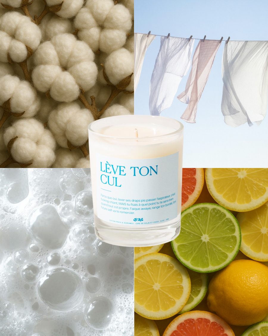 Bougie Coton Frais & Agrumes entourée de coton, de linge propre, de mousse de savon et d'agrumes